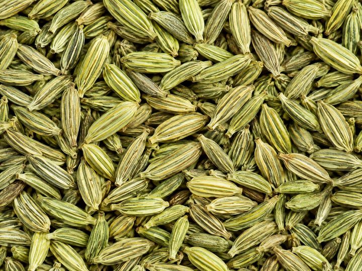 Whole fennel seeds filling the frame